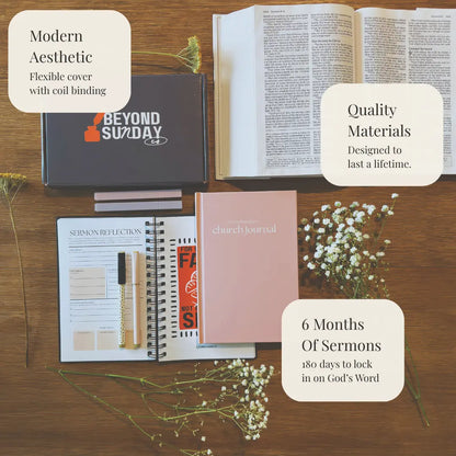 Collection of books and journals on a wooden surface with text highlighting features.